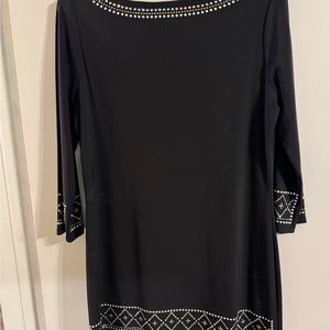 Beautiful mid length elegant dress.